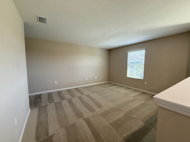 Building Photo - Spacious 4-Bedroom Retreat with additional office/den in the Heart of Trinity!