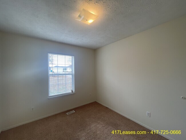 Building Photo - 1849 W Farm Rd 102