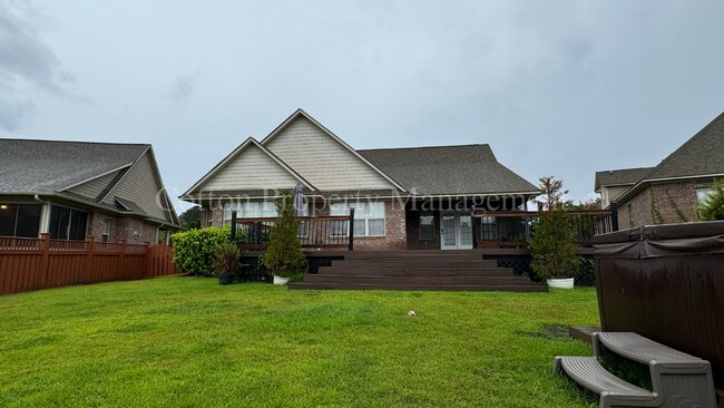 Building Photo - 4BR/3BA Well appointed home in the gated c...