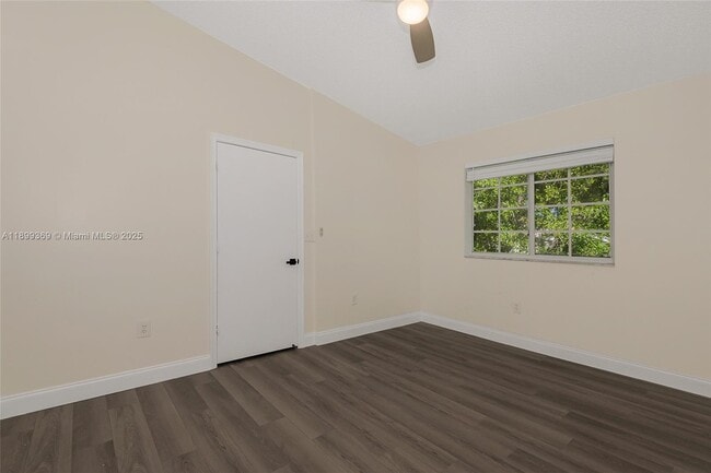 Building Photo - 3211 Sabal Palm Manor