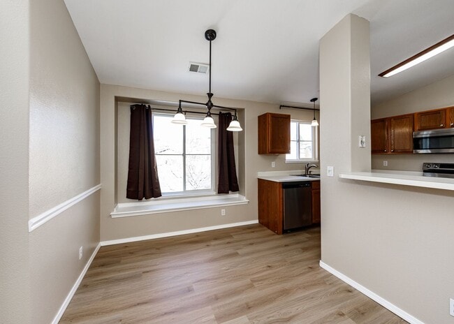 Building Photo - 3 Bed Top Floor Condo near Ft. Carson in Gated Community with detached Garage