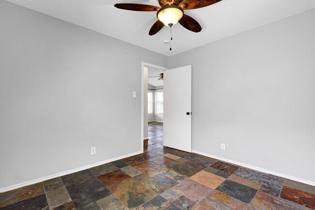 Building Photo - Carpet-Free Home with High Ceilings & Outdoor Retreat