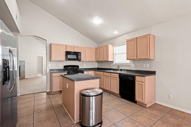 Building Photo - 5432 Santiago Roque Dr