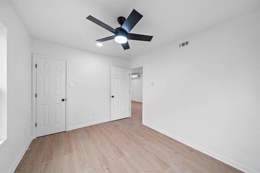 First bedroom with updated fan. - 2312 Lucinda St