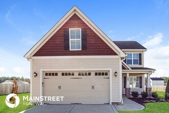 Building Photo - 187 Day Lily St