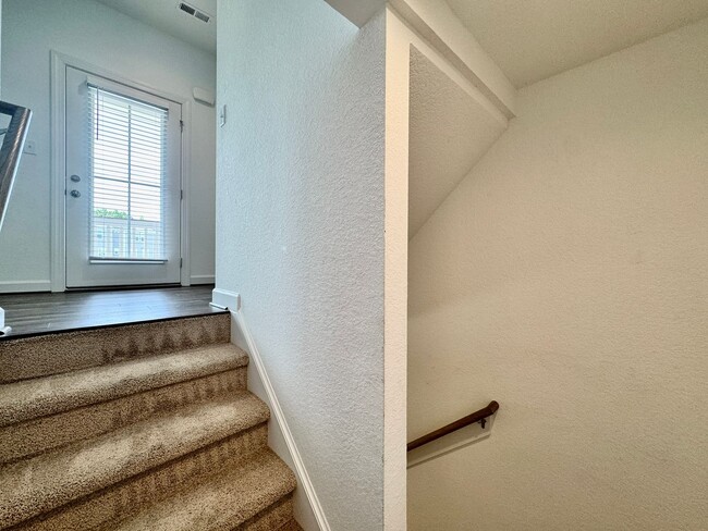 Building Photo - Practically New & Available May 1st! Luxur...