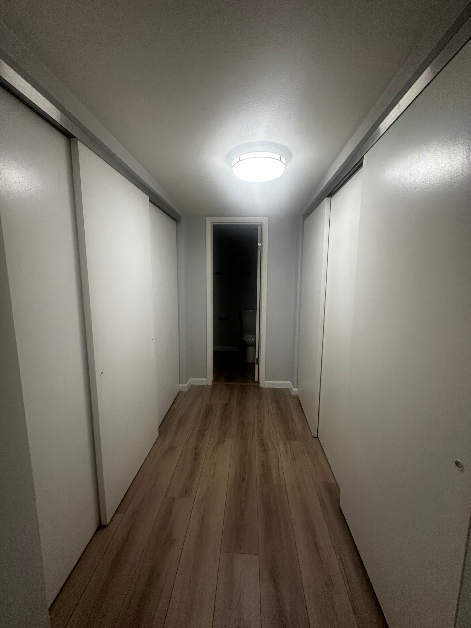 Expansive double closets with three doors leading into the bathroom - 12170 Huron St