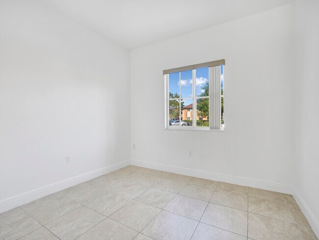 Building Photo - 18240 NW 59th Ave