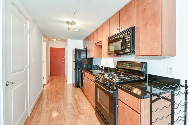 Building Photo - Gorgeous Studio w/ Hardwoods & Balcony