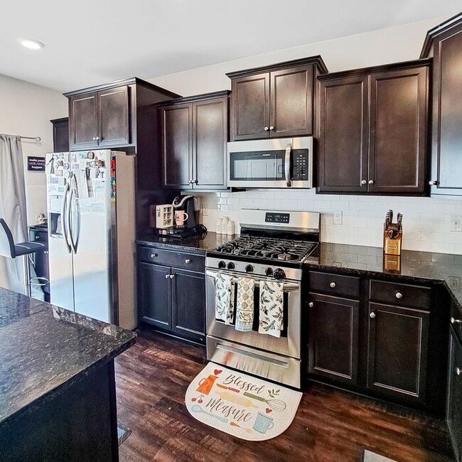 Building Photo - Gorgeous 3-Level End Unit Townhome, 3 Bedr...