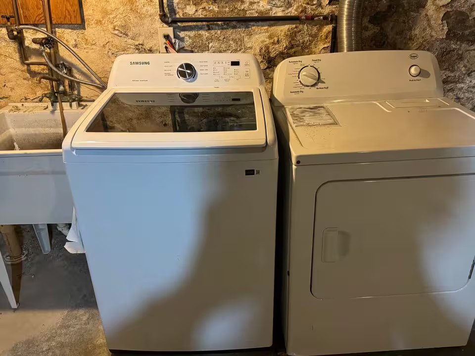 Washer, dryer, and wash tub in basement - 4313 Kish Way