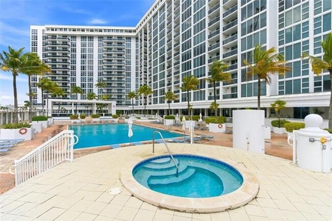 Building Photo - 10275 Collins Ave
