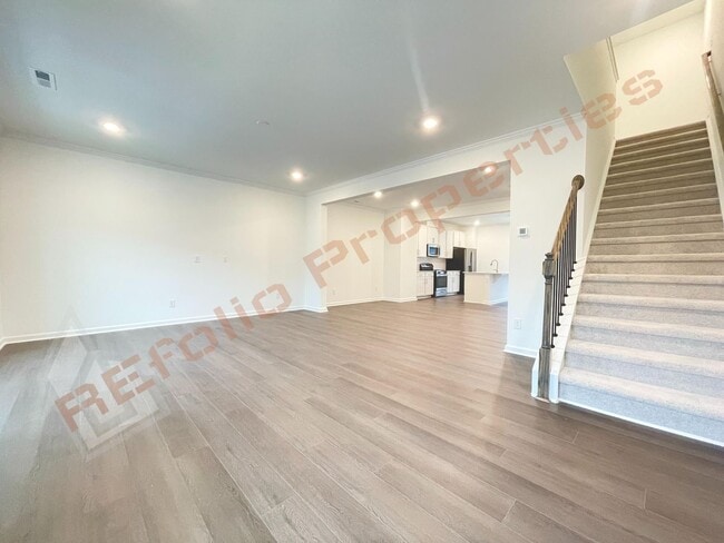 Building Photo - Brand New 3 Story, 4 bedroom, 3.5 bathroom Townhome Featuring a 1st floor Guest Suite, 2 Car Gara...