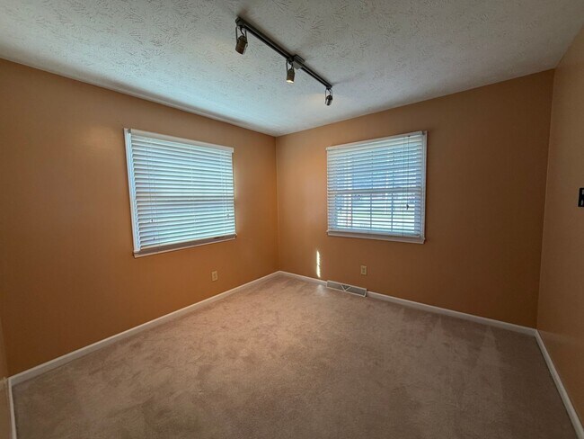 Building Photo - Goodyear Heights Gem with Fireplace, Attached Garage & Massive Backyard