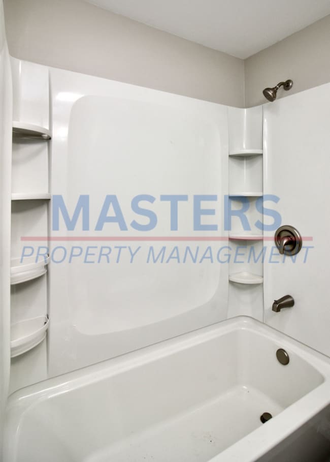 Building Photo - Three bedroom with 1 and a half bath tradi...