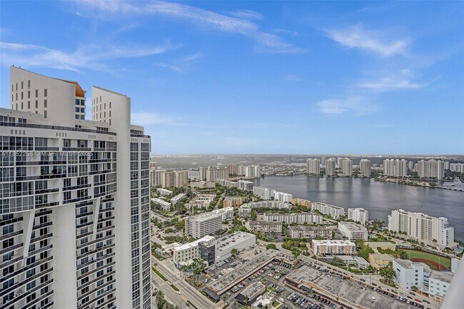 Building Photo - 18201 Collins Ave
