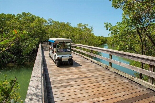 Building Photo - 6075 Pelican Bay Blvd