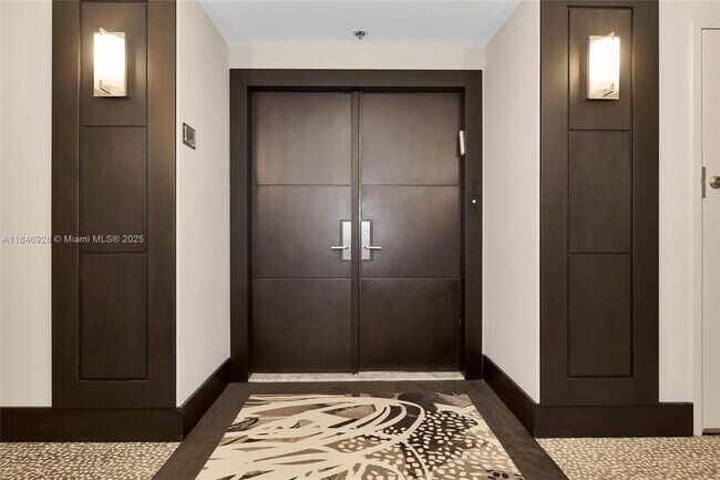 Building Photo - 10205 Collins Ave