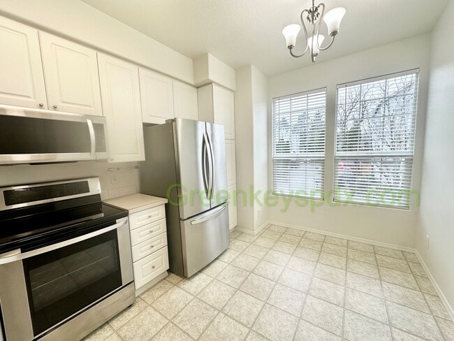 Building Photo - Amazing 2-Bedroom Townhouse with 2.5 Bathrooms, Attached Garage, Private Fenced Patio