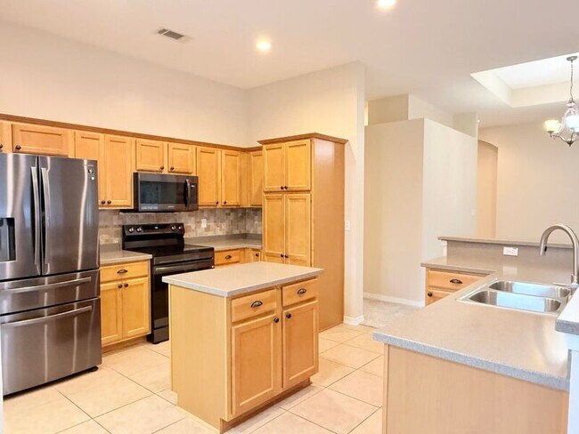 Building Photo - 5659 Tiger Woods Dr