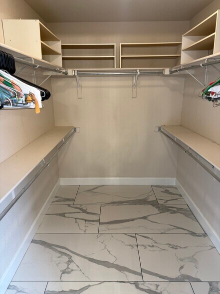 Large master walk-in closet - 2675 S University Blvd