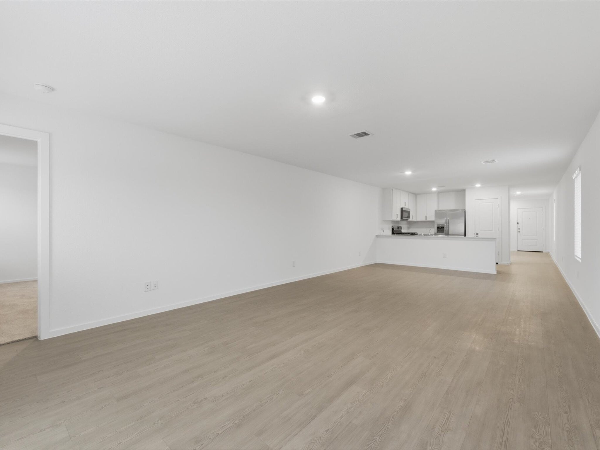 Living space view toward the kitchen - 25409 Carnation Ct