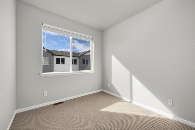 Building Photo - Gorgeous NEW Three Story Townhome with two car attached garage!