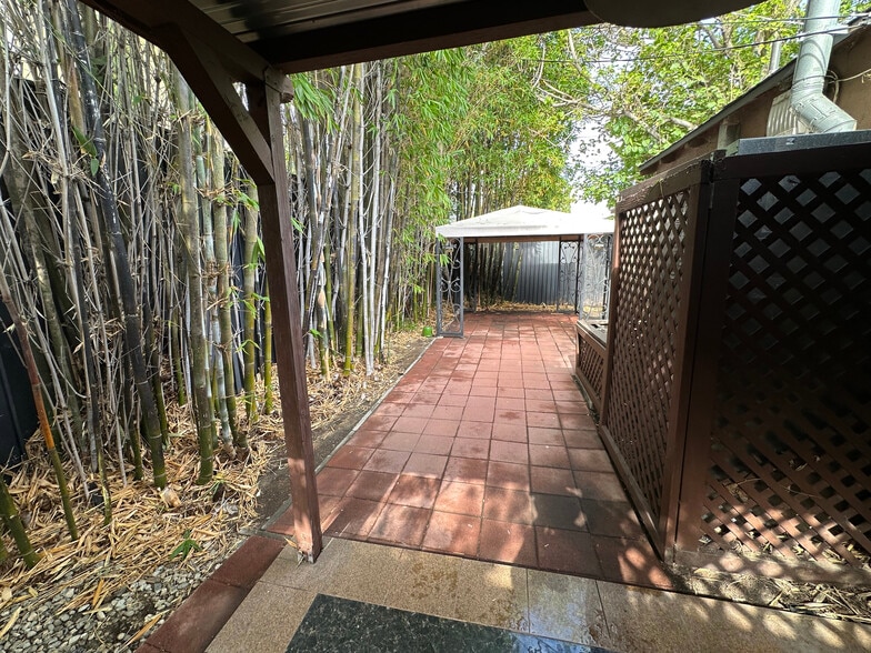 View from patio of gazebo - 10809 Huston St