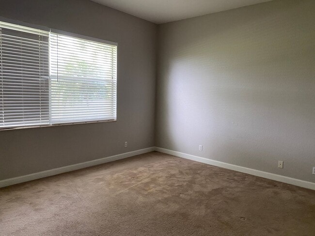 Building Photo - SPACIOUS 3/2 IN SAINT JAMES GOLF COMMUNITY