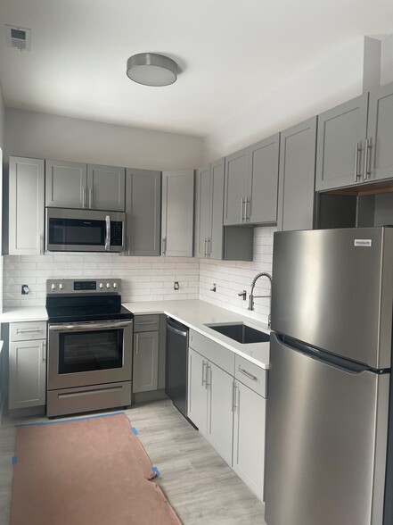 Kitchen with Stainless Steel Appliances - 216 Findlay St