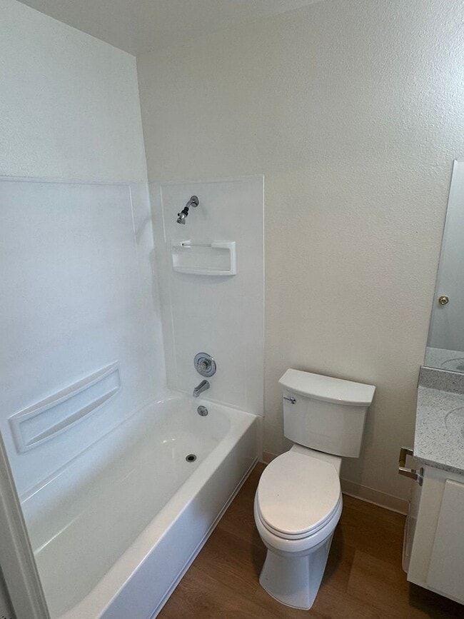 Building Photo - Upstairs two-bedroom 1/12 bath condo avail...