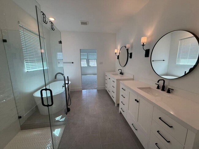 Building Photo - Move-in ready and like-new! Washer, dryer, and refrigerator Included.