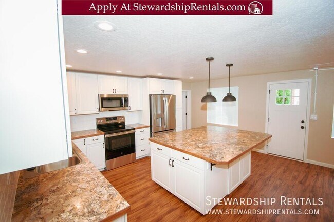 Building Photo - 1010 E 18th Ave