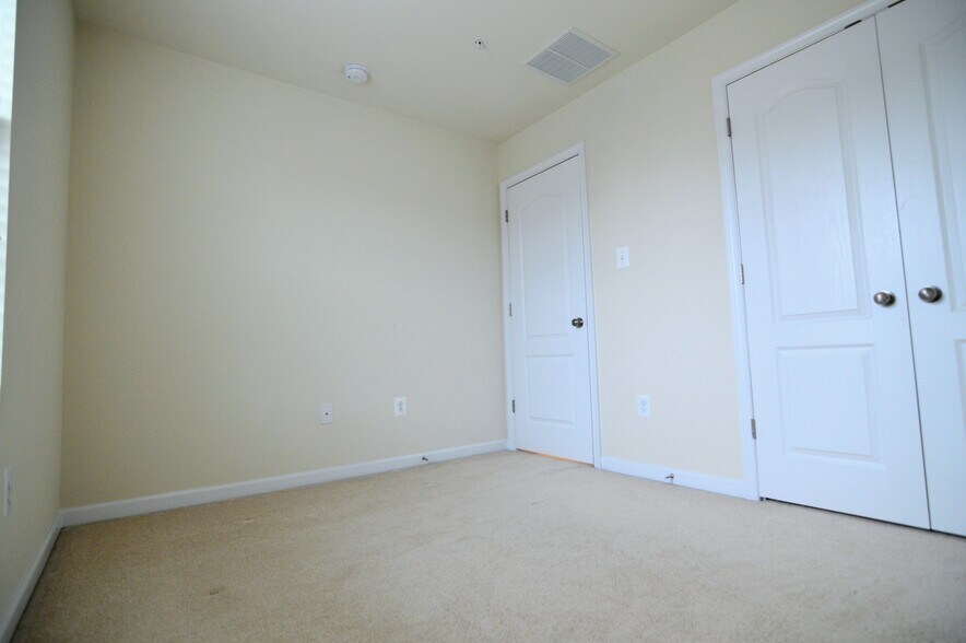 Bedroom #3 with double door closet - 11696 Palm Desert Pl