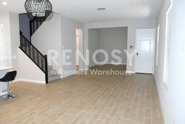 Building Photo - Price Improved – Spacious Townhome in a Gated Community!