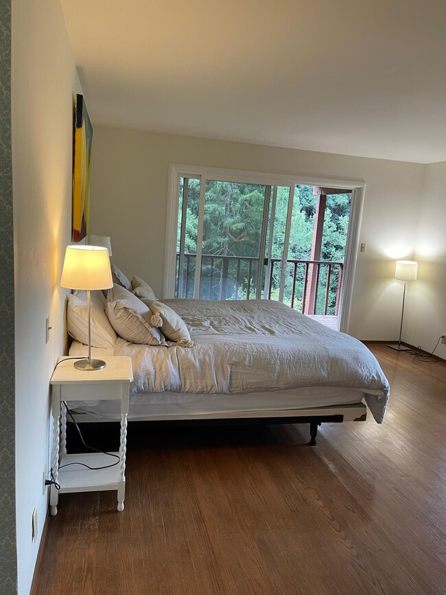 Master Bedroom with walk out windows to nature - 5 Coronet Way