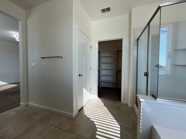 Building Photo - Beautiful 4 Bedroom Solar Home With Low Maintenance Landscaping And Updated Interior