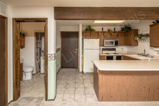 Building Photo - CENTRALLY LOCATED 1 BEDROOM CONDO
