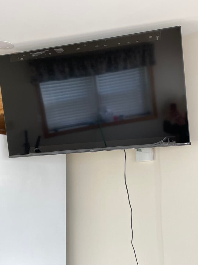 55" Smart Roku TV with articulating wall mount, so you can watch TV from the couch or dining table - 6030 NY-23