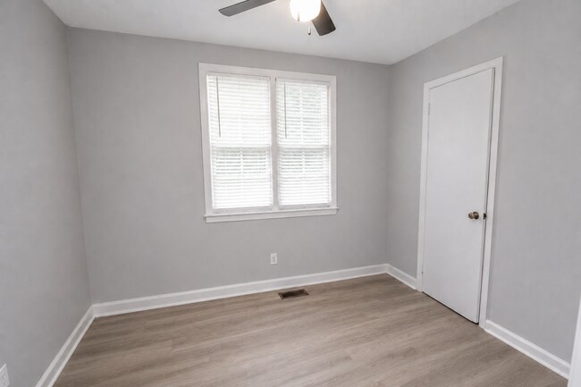 Building Photo - Updated Multi-Bedroom Home | Brand-New Deck | Circular Drive | Triad Premier Realty