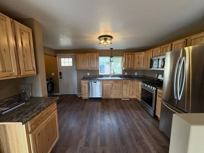 Building Photo - 2 large storage sheds! Starlink! Great Views!