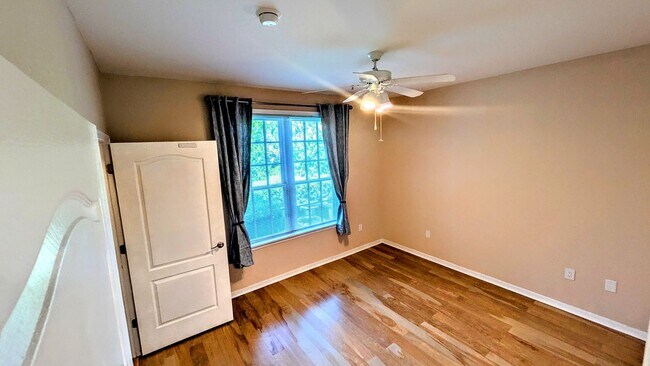 Building Photo - ANNUAL UNFURNISHED GROUND FLOOR CONDO 3 BED 2 BATH