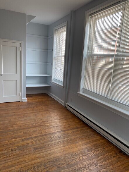 Storage closet and additional shelving being installed in Livingroom - 114 E Main St
