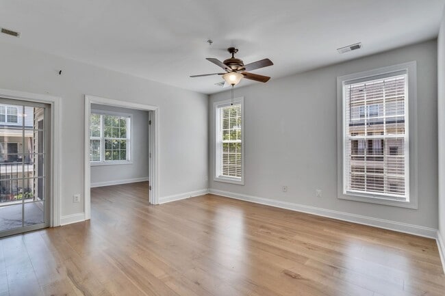 Building Photo - Spacious End Unit with Garage in Gated Com...