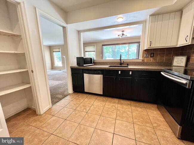 Building Photo - 8620 Trumbauer Dr