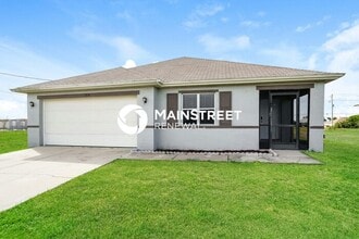 Building Photo - 4 Bedroom Pet-Friendly Home in Cape Coral, FL with Main Street Renewal