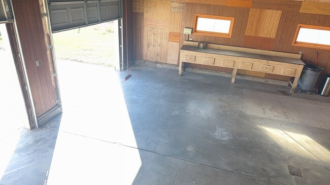 Building Photo - Spacious, four-bedroom, two-bathroom, coun...