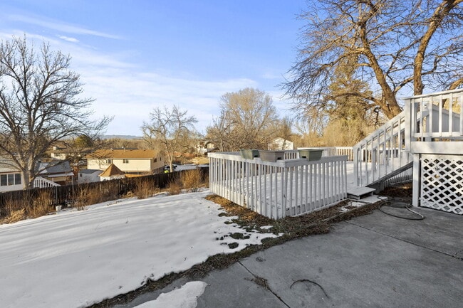 Building Photo - Spacious Split-Level Home with Beautiful Kitchen, Large Deck, and Fully Fenced Yard