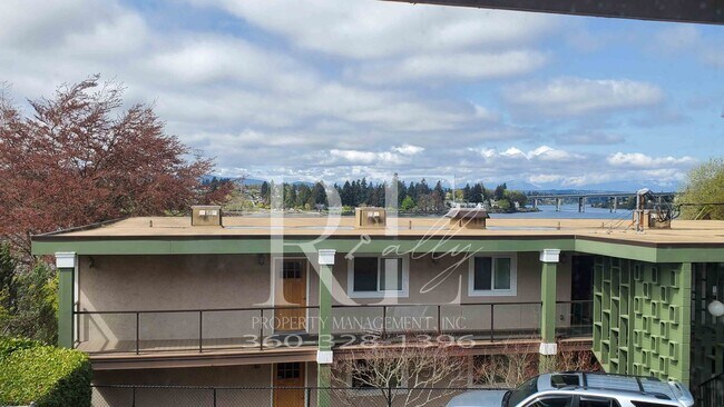 Building Photo - Modern Manette 1BR Condo with Private Pati...
