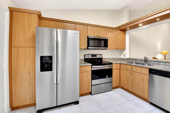 Building Photo - 10938 Roebelini Palm Ct